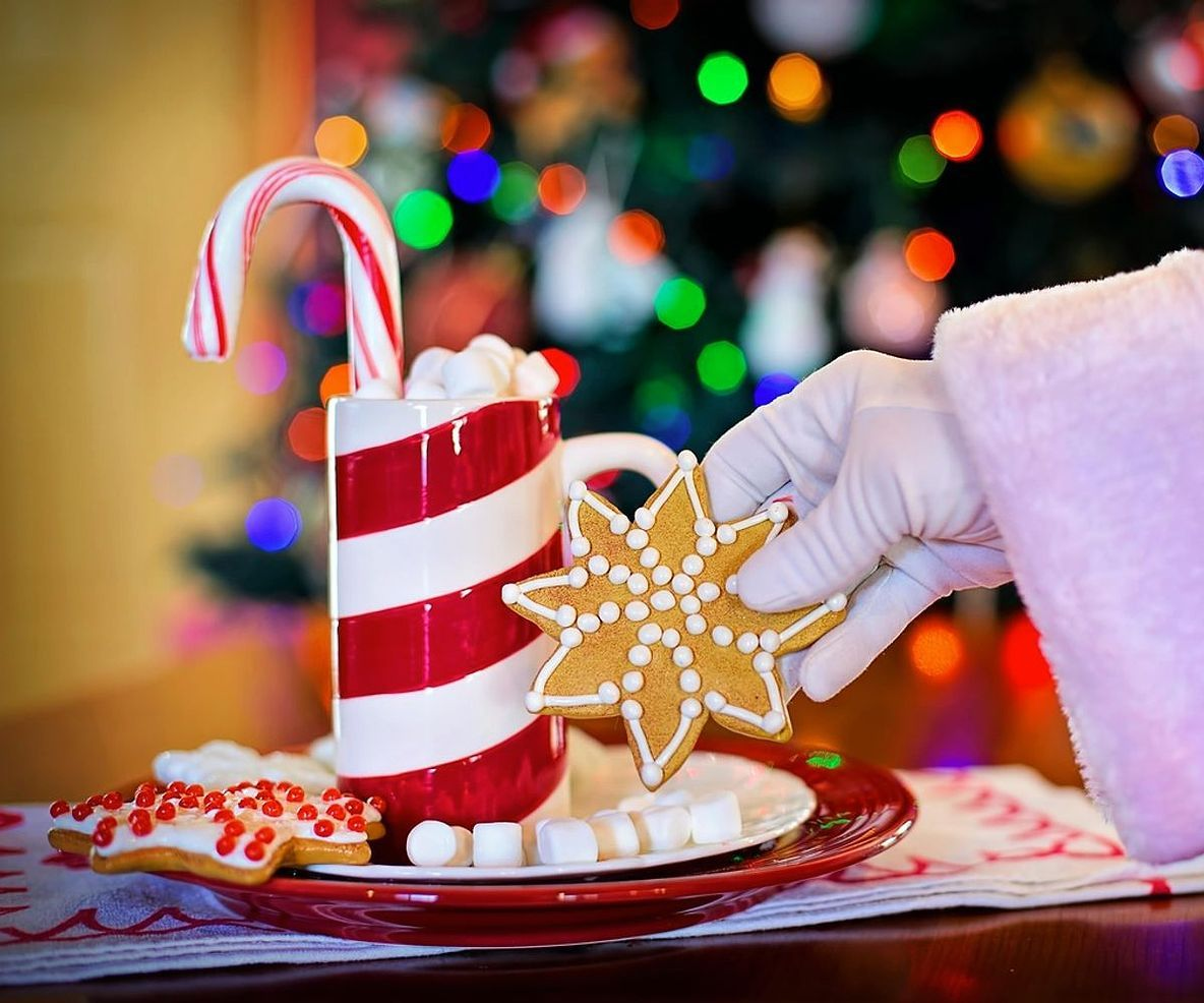 Hands wrapping premium sweets with care